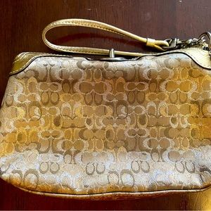 Small-medium sized coach wristlet
